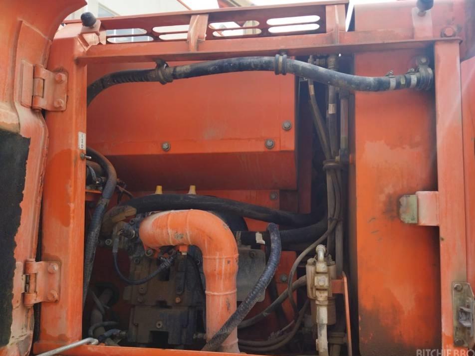 Excavator pe roti - Doosan DX 140 W