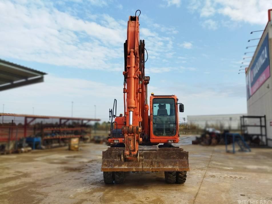 Excavator pe roti - Doosan DX 140 W
