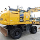 Excavator pe roti - Komatsu PW180-10 German+New tyres
